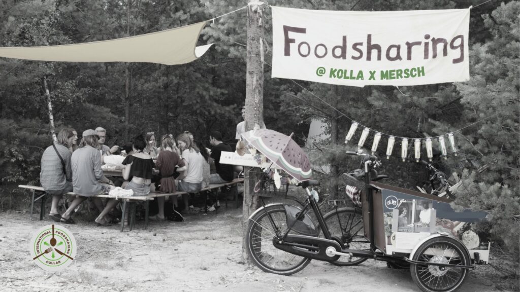 People sharing food around a table with a banner at the side with the text "Foodsharing - Kolla x Mersch"